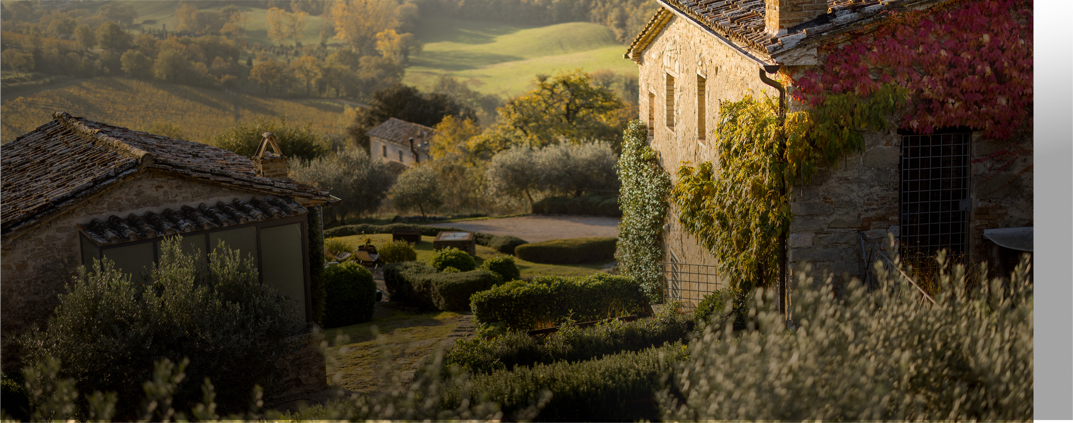 Beautiful italian house with a large garden in rolling hills in the sunset